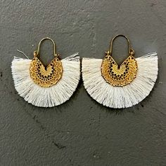 Gold & Cream Fringe Festival Statement Earrings These Dangle Earrings Are Super Chic For Your Next Concert Outfit! Brand New Without Tags Nickel-free White Bohemian Chandelier Earrings, White Bohemian Nickel-free Chandelier Earrings, Bohemian White Nickel-free Chandelier Earrings, White Drop Earrings With Latkans, White Latkans Drop Earrings, Gold Elegant Tassel Earrings For Festival, Elegant Gold Tassel Earrings For Festival, Bohemian White Tassel Earrings For Pierced Ears, White Latkan Drop Earrings