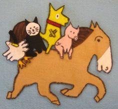 an image of cats and dogs riding on the back of a horse that is made out of felt