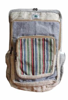 Modern Hemp Travel Backpack is made up of a mixture of 50% organic hemp and 50% cotton. The special feature of this backpack is the colorful fabric and the organic cotton material used outside of the pockets.  Size: 16 x 10 x 4 inch (Height x Length x Width) Weight: 700gm Material: 50% Hemp and 50% Cotton Inside Backpack: Single Zipper which has a separate compartment for 14'' laptop  Outside Backpack: Two water holder side pocket and one small compartment  Best quality zipper Comfortable and ad Casual Beige Cotton Backpack, Multicolor Cotton Backpack For Daily Use, Green Cotton Rectangular Backpack, Green Rectangular Cotton Backpack, Eco-friendly Multicolor Travel Backpack, Eco-friendly Multicolor Rectangular Backpack, Eco-friendly Rectangular Multicolor Backpack, Eco-friendly Cotton Backpack, Eco-friendly Cotton Standard Backpack