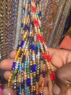 "FREE SHIPPING!! Please Note: Please scroll to see options. **These waist beads ship from Ghana, West Africa. They are traditional and authentic yet fancy and fashionable.* **Shipping takes 3-5 days to be delivered.* **I will send you nice selection of Waist beads unless you want to make your own choices, then you can email me to send you individual pictures of the waist beads. #Waist beads sizes vary from 30\"- 45\" #They are all made with cotton threads #Bead sizes vary from 6/0, 8/0 12/0 Note Traditional Beaded Waist Beads As Gift, Festival Gold Beads Waist Beads, Festival Gold Round Beads Waist Beads, Festival Gold Waist Beads, Traditional Multicolor Gold Beads, Traditional Beaded Bracelets With Oval Faceted Beads, Handmade Traditional Gold Waist Beads, Traditional Handmade Gold Waist Beads, Spiritual Multicolor Round Waist Beads