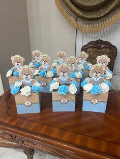 there are many small boxes with teddy bears in them