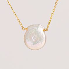 "A beautiful and delicate necklace, it will give the last touch to your modern layered look.  Perfect for mom, a friend, a sister or any special person! You will never be wrong with this lovely piece.  Flat Teardrop Freshwater Pearl Necklace * .925 Sterling Silver or 14K Rose Gold Filled or 14K Gold filled for quality heirloom (is hypoallergenic, safe for sensitive skin) * Raw material from USA or Italy, will last for years with proper care. * Beautiful package without an invoice, ready for gift Delicate Pearl Necklace With Delicate Chain For Gift, Everyday Pearl Charm Necklace For Mother's Day, Personalized Pearl Necklace For Gift, Dainty Pearl Pendant Necklace For Mother's Day, Dainty Pearl Necklace With Adjustable Chain, Pearl Necklace With Adjustable Chain As Gift, Adjustable Delicate Chain Pearl Necklace As Gift, Delicate Necklace For Mother's Day, Minimalist White Necklace For Mother's Day