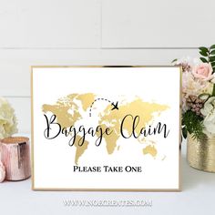 a sign that says baggage claim on it next to some flowers and vases with roses