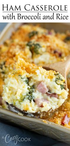 ham casserole with broccoli and rice in a baking dish on a wooden spoon