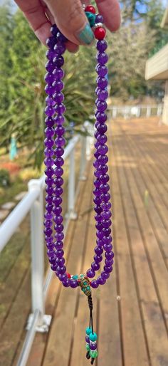 An amethyst prayer bead would be a beautiful and spiritually significant tool for meditation and prayer. Amethyst is a violet variety of quartz crystal known for its calming and purifying properties. It is believed to aid in meditation, enhance spiritual awareness, and promote inner peace and healing. Amethyst prayer beads, also known as mala, are used in various spiritual practices to count repetitions of mantras or prayers. the soothing energy of amethyst can help the practitioner to focus the Lavender Amethyst Crystal Necklaces With Round Beads, Amethyst Crystal Necklaces With Polished Round Beads, Amethyst Crystal Necklace With Round Beads, Amethyst Crystal Necklaces With Round Beads, Amethyst Crystals For Meditation, Spiritual Amethyst Necklace With 108 Beads, Spiritual Amethyst Crystal Necklace With Gemstone Beads, Amethyst Gemstone Beads Necklace For Meditation, Amethyst Gemstone Crystal Necklaces With Round Beads