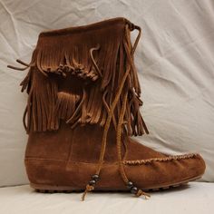 Brand New Minnetonka Decorah Double Fringe Moccasin Boots In The Color Dusty Brown. Leather Upper, Manmade Sole. Pull On Boot Made Of Extremely Buttery Soft Leather Material! Would Be Great For Every Day Wear Or To Go To A Music Festival. From A Smoke Free And Pet Free Home. Any Questions Please Ask. Hair Clip In Image Not Included. Reasonable Offers Considered. Like More Than One? Ask About Bundling! Western Suede Moccasins For Fall, Western Style Suede Moccasins For Fall, Suede Closed Toe Moccasins For Festival, Brown Bohemian Moccasins For Fall, Western Moccasins With Rubber Sole For Fall, Suede Moccasins With Tassels And Round Toe, Western Style Closed Toe Moccasins For Fall, Bohemian Brown Moccasins For Fall, Casual Brown Moccasins With Tassels