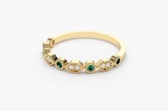 "14k Gold Art Deco Emerald and Diamond Half Eternity Womens Wedding Ring / Stackable Emerald Diamond Ring / May Birthstone Ring / Christmas Ferkos Fine Jewelry Item Details ✔ Made to Order ✔ Gold Kt: 14K (also available in 18K) ✔ Available Gold Color: Rose Gold, Yellow Gold, White Gold ✔ Round Diamond: 8 pcs 1.25 MM ✔ Round Emerald: 5 pcs 1.85 MM ✔ Number of Stones: 13 ✔ Total Diamond ctw: 0.08 Ctw ✔ Total Emerald ctw: 0.15 Ctw ✔ Diamond Color-Clarity: G Color SI Clarity ✔ Width of Band: 1.4MM ✔ Elegant Green Stackable Diamond Ring, Elegant Green Stackable Rings, Elegant Green Stackable Rings With Half Eternity, Elegant Green Stackable Half Eternity Rings, Elegant Green Stackable Rings For Anniversary, Elegant Green Stackable Eternity Band, Elegant Green Diamond Eternity Band, Elegant 14k Gold Multi-stone Eternity Band, Gold Emerald Ring With Bezel Setting For Wedding