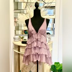 100% Silk Sleeveless V-Neck Solid Ruffle Accents, Frills & Ruffles Purple Size M 30” Chest, 29" Length On Back 23” On Front. Nordstrom Tag Attached $298 Feminine V-neck Camisole With Ruffles, Fitted V-neck Camisole With Ruffles, Chic V-neck Ruffled Camisole, Fitted V-neck Tank Top With Ruffles, Spring V-neck Ruffled Tank Top, Spring V-neck Tank Top With Ruffles, V-neck Ruffled Tank Top For Spring, Feminine Sleeveless Camisole For Date Night, Feminine V-neck Ruffled Camisole