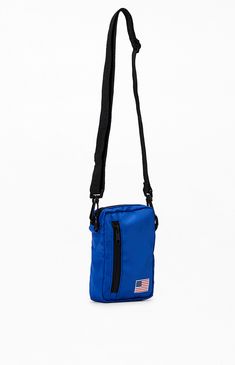 PacSun exclusive! Store everything you need in the Olympics Team USA Crossbody Bag. With ample storage pockets including a roomy main compartment and front zipper pocket, this bag makes it easy to keep everything handy. It's finished off with a removable adjustable crossbody strap and Team USA branding on the front.


	Removable adjustable crossbody strap
	Roomy main compartment
	Front zipper pocket
	Team USA Olympics branding Functional Blue Shoulder Bag With Pockets, Blue Shoulder Bag With Functional Pockets, Blue Bags With Functional Pockets For On-the-go, Blue Nylon Bag With Functional Pockets, Blue Bags With Functional Pockets For Outdoor Use, Outdoor Blue Bags With Functional Pockets, Blue Outdoor Bags With Functional Pockets, Blue Nylon Shoulder Bag With Cell Phone Pocket, Blue Bags With Functional Pockets For Everyday Use