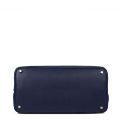 Polish every style choice by carrying this <b>new, stylish, light weighted tote</b> by the round elegant handles Everyday Navy Bag With Handles, Everyday Navy Bags, Classic Satchel With Rolled Handles, Blue Leather Bag With Round Handle, Blue Leather Bags With Round Handle, Luxury Navy Bags With Gold-tone Hardware, Navy Bag With Top Handle, Blue Shoulder Bag With Top Round Handle, Luxury Navy Shoulder Bag With Handles