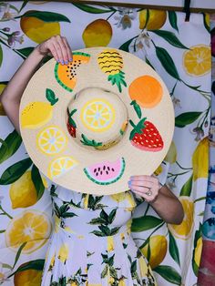 Custom hand painted fruit floppy beach / festival hat. Perfect for any occasion under the sun! Wear it to the beach, bachelorette party, vacation, wedding, parties, festivals & more! Fruit designs include: strawberries, lemons, pineaplpes, watermelons, & oranges. Bright and colorful, you'll certainly stand out from the crowd in this showstopper number. ****Please Note: Due to the handcrafted nature of this item, designs may ever so slightly vary. Playful Handmade Sun Hat For Summer, Multicolor Sun Hat For Summer Garden Party, Playful Curved Brim Straw Hat For Summer, Playful Summer Sun Hat For Festivals, Playful Summer Beach Straw Hat, Fun Spring Sun Hat, Cute Yellow Summer Sun Hat, Whimsical Adjustable Sun Hat For Summer, Handmade Whimsical Sun Hat For Summer