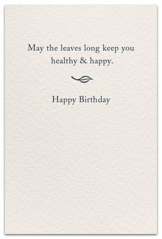 a white card with the words happy birthday written in blue ink on it and an image of