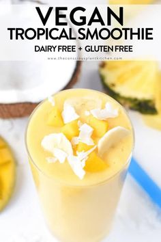 a smoothie is garnished with pineapple and coconut