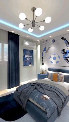 a bedroom with a soccer theme on the wall