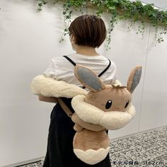 Get ready to catch 'em all with these limited edition Eevee backpacks! Perfect for any Pokémon fan, these fluffy plush backpacks from the Pokémon Center Japan feature a cute button and measure 83cm/32.6in. Don't miss out on this amazing addition to your collection. #Pokemon #Eevee #Backpack #LimitedEdition #PokemonCenterJapan Pokemon Bag, Pokemon Accessories, Pokemon Center, Pokemon Eevee, Plush Backpack, Catch Em All, Pokemon Fan, Anime Figures, Animation Art