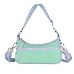 Brand New! Originally 130 Casual Nylon Satchel With Zipper Closure, Spring Nylon Shoulder Bag With Removable Pouch, Nylon Double Handle Shoulder Bag For School, Blue Nylon Shoulder Bag With Detachable Strap, Green Nylon Bags With Pockets, School Shoulder Bag With Double Handle In Nylon, Blue Baguette Bag For Travel, Casual Baguette Bag With Detachable Strap For Errands, Sporty Travel Bags For Spring