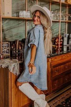 - Step up your style game with this adorable denim mini dress! With its flirty frayed hemline and just the right amount of edge, it's the ultimate blend of fun and fashion. Whether you are brunching with friends or hitting the town, this dress is your go-to for easy style with a trendy twist! - Unlined stretchy denim material - A collared neckline - A buttoned front - Functional chest pockets - Short sleeves with rolled cuffs - A relaxed silhouette that ends in a curved, frayed mini dress length Concert Fashion, Essential Dress, Easy Style, Denim Material, Cute Comfy Outfits, Denim Mini Dress, Curve Dresses, Light Wash Denim, Denim Mini