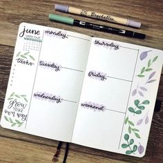 an open planner with the words june on it