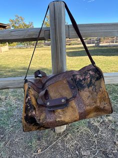 Genuine Leather Cowhide Duffle Bag. It measures 20 inches long and 9 inches in depth. Strap measures 44 inches long while the handles measure 22 inches long.   Thank you for checking out my store, if you have any questions please contact me!!    Exported By ExportYourStore :) SKU:472384902925_EDA4* Leather Travel Bag With Handles For Weekend Trips, Brown Rectangular Bags For Weekend Trips, Brown Rectangular Travel Bag With Adjustable Strap, Rectangular Brown Duffle Bag For Weekend Trips, Brown Duffle Bag With Adjustable Strap And Double Handle, Brown Rectangular Duffle Bag For Weekend Trips, Brown Rectangular Duffle Bag For Daily Use, Brown Duffle Bag With Top Handle For Weekend Trips, Brown Rectangular Shoulder Bag For Weekend Trips