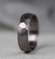 a wedding band that has been made to look like hexagonal shapes