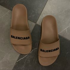 Balenciaga Logo Pool Slides In Beige/Black, Size 7us/37eu. It Runs Small So This Fits Like A Size 6. Good Condition, Some Visible Scratches On The Tan From Wear. Comes With Box And Dust Bag. Welded Logotype Pops In Texture And Dimension From The Bridge Of An Inky Black Sport Slide Molded With A Contoured, Comfortable Footbed. - Contoured Footbed - Synthetic Upper/Synthetic And Textile Lining/Synthetic Sole - Made In Italy Link: Https://Www.Balenciaga.Com/En-Us/Pool-Slide-Sandal-Beige-565547w1s809710.Html Balenciaga Slides, Balenciaga Sandals, Shoes Balenciaga, Pool Slide, Balenciaga Logo, Black Slides, Shoe Bags, Slides Women, Balenciaga Shoes