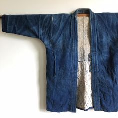 Vintage from the 1940s vintage Japanese indigo dyed kendo jacket From Japan Size shoulder to shoulder : 23"  Chest 23"  length: 32" (81.2 cm) The fabric changes color and is original from wear. The old one lacks many points, but I think it's a beautiful and rare work of art. Vintage Indigo Outerwear Pre-washed, Vintage Indigo Cotton Denim Jacket, Vintage Indigo Pre-washed Outerwear, Vintage Pre-washed Indigo Outerwear, Indigo Cotton Outerwear With Natural Dye, Vintage Indigo Cotton Outerwear, Blue Outerwear With Natural Dye, Blue Long Sleeve Outerwear With Natural Dye, Japanese Clothing Design