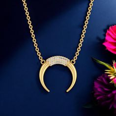 A half moon gold plated diamond necklace is a beautiful and elegant piece of jewelry that features a half moon shape adorned with diamonds. The necklace is typically made from 14K or 18K gold plating, which provides a luxurious and durable finish. The half moon design is often crafted with intricate details, showcasing the beauty of the diamonds. The necklace is a beautiful representation of celestial beauty, making it a popular choice for those who love elegant and sophisticated jewelry. With i Half Moon Design, Half Moon Necklace, Moon Gold, Sophisticated Jewelry, Necklace Moon, Moon Shape, Necklace Minimalist, Moon Design, Necklaces For Women