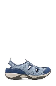 Go the extra mile in this lightweight performance walking shoe featuring a stretchy bungee upper with chic cutout details and a removable contoured footbed. 1 1/2" heel Removable, cushioned insole with arch support Leather and textile upper/textile lining/rubber sole Imported Blue Sneakers With Arch Support For Walking, Blue Sneakers With Arch Support, Blue Ergonomic Sneakers With Arch Support, Ergonomic Blue Sneakers With Arch Support, Blue Walking Shoes With Removable Insole For Sports, Blue Functional Sport Sandals With Cushioned Footbed, Functional Blue Sport Sandals With Cushioned Footbed, Casual Breathable Sport Sandals For Walking, Blue Slip-on Walking Shoes With Removable Insole