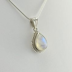 Sku 5379 Sterling Silver Rainbow Moonstone 10x19mm Teardrop Pendant 1 1/8"h x 1/2"w Moonstone is a birthstone for June, along with pearl and alexandrite. Moonstone has been used in jewelry since ancient civilizations. Romans and Greeks associated it with their lunar gods and goddesses. Romans believed that moonstone was formed from frozen moonlight. Legends say that moonstone brings good luck. Chain Sold Separately. Shown on a 18” Sterling Silver Snake Chain for $39.50. Moonstone Necklace Silver, Rainbow Moonstone Jewelry, Handmade Clay Jewelry, Rainbow Moonstone Necklace, Silver Snake Chain, Teardrop Pendant, Moonstone Necklace, Moonstone Jewelry, Ancient Civilizations