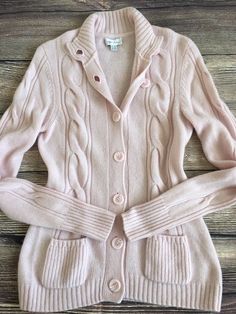 "Peter Hahn - wonderfully soft luxury - 100% merino wool - virgin wool -  cable knit cardigan. Label size - UK 12, F/B 40, D 38 bust from pit to pit - 17 1/2\" or 44 1/2 cm waist from side to side seam - 15 1/2\" or 39 1/4 cm nape to hem - 26 1/2\" or 67 1/4 cm sleeve from pit to cuff - 19 1/2\" or 49 1/2 cm Garment was measured flat, please double where appropriate.  Elaborately cable knit texture in an antique pink tone, ultra-soft touch - skin friendly, for a country yet casual look. Cable knit to the front and along the long sleeves, ribbed high neck, large-sized buttons fastening on the vertical-ribbed edges - shape retaining Two small pockets, ribbed broad cuffs & ribbed welt, plain rear. As perfect and immaculate as new condition. Immaculately clean & ready to wear. Thank you for yo Cashmere Cable Knit Sweater Coat, Classic Merino Wool Cable Knit Sweater Coat, Cable Knit Merino Wool Cardigan, Long Sleeve Merino Wool Cable Knit Sweater Coat, Merino Wool Cable Knit Long Sleeve Cardigan, Cable Knit Merino Wool Long Sleeve Cardigan, Cozy Cashmere Cable Knit Sweater Coat, Fitted Merino Wool Cable Knit Outerwear, Fitted Cable Knit Merino Wool Outerwear