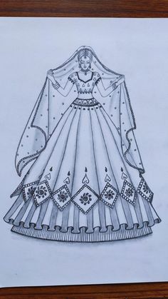 a drawing of a dress on paper