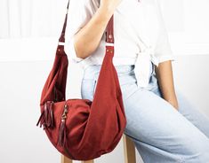 "The kallia crossbody / shoulder bag in rusty red cotton canvas and matching sheep leather accents. All the leather parts can be removed from the bag so it is easier to clean it, in case it gets dirty. Not to mention that you can order extra handles and zipper pulls and interchange the colors depending on mood or outfit. You can either choose a long adjustable strap and carry this bag as a crossbody bag or the short handle and use it as a shoulder bag. Of course, if you want both types of handle Versatile Canvas Crossbody Hobo Bag, Canvas Crossbody Hobo Bag, Fall Canvas Shoulder Bag With Adjustable Strap, Fall Canvas Bag With Adjustable Strap, Burgundy Hobo Shoulder Bag For Travel, Canvas Hobo Bag With Detachable Strap, Red Hobo Bag For Fall Travel, Fall Travel Red Hobo Bag, Burgundy Crossbody Hobo Bag For Everyday Use