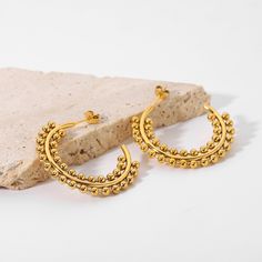 Turn heads with the Allison Earrings. Add an edge to your daily delicates with these stylish hoops. Details: 18k Gold Plated Stainless Steel Diameter: 35.58 mm Retro Earrings, Retro Earring, Gold Piece, Beaded Hoop Earrings, Beaded Hoops, Jewelry Pouch, Water Proof, Sophisticated Style, Earring Necklace