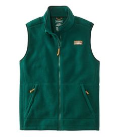 Our best-value fleece vest is designed with inspiration from our archives and made from 100% recycled polyester for unbeatable comfort and wear-anywhere style. Slightly Fitted. Best with lightweight layer. Falls at hip. 100% recycled polyester fleece. Machine wash and dry. Features our classic Mount Katahdin logo. Bean Boot lace-inspired zippers and drawcord. Two lower zippered hand pockets. Elastic arm holes and drawcord hem seal out cold air. Imported. Mount Katahdin, Men's Vests, Mens Vests, Bean Boots, Fleece Vest, Cold Air, Mens Outerwear, Ll Bean, L L Bean