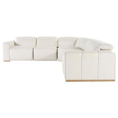 a white leather sectional sofa with two reclinings on the back and one end