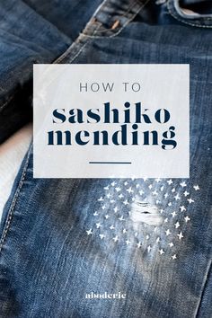 a pair of jeans with the words how to sashiko mending on them