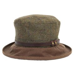 A smart but casual spring walking hat with style!  It combines a waterproof waxed tan brim and warm green rainproof tweed.  A smart leather strap finishes the whole look.It matches a pair of tan boots perfectly and brings a bit of cowboy chic to rainy rambles!This is our BETTY TWEED WAX HAT:•Handmade from warm winter rainproof tweed•Has a weather resistant lining inside the crown•Matched with a glamorous brim in tan waxed cotton•Sports a dark brown leather strap around the crown - adds to the sm Brown Waxed Brimmed Hats, Brown Waxed Finish Hats, Brown Brimmed Cloche Hat For Outdoor, Brown Wide Brim Cloche Hat For Outdoor, Casual Fall Hunting Hats, Casual Hunting Hats For Fall, Classic Tweed Hats For Outdoor, Fall Outdoor Flat Cap, Adjustable Cloche Hat For Fall Outdoor Events