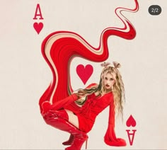 a woman in red dress and high heeled boots holding a card with hearts on it