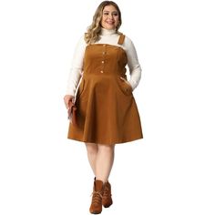 Versatile Style: This corduroy pinafore dress can be worn in different ways, making it suitable for various occasions, from casual to formal events. Trendy Design: The overall style of this dress is currently on-trend, making it a great addition to any fashion-forward woman's wardrobe. Quality Material: Made of soft and durable corduroy fabric, this dress is not only comfortable but also long-lasting, ensuring great value for money. Easy Maintenance: This dress is machine-washable, making it sim Casual Brown Pinafore Dress For Fall, Casual Corduroy Pinafore Dress For Fall, Corduroy Pinafore Dress, Suspender Skirt, Pinafore Dress, Overall Dress, Women's Wardrobe, Shorts With Pockets, Formal Event