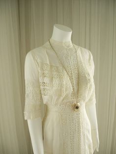 "Perfect condition, true white, cotton batiste dress with insets of tatted lace and embroidered tambour lace, among various others. Very clean and ready to wear. No issues, no stains, tears, or discolorations. About the best that you can get. Still has original hardware and buttons. Inside waistband is fully intact, which many times this is the first thing that rots. Beautiful and dainty in looks but strong in construction. Wonderful tea length, even for a tall person. Please zoom in to see all Edwardian Day Dress, Edwardian Gowns, Edwardian Dress, Lawn Dress, White Cotton Dress, Victorian Clothing, Vintage Gowns, Lingerie Dress, Edwardian Fashion