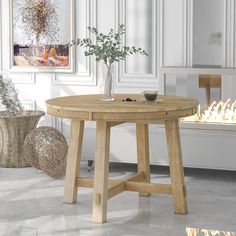 a wooden table sitting in front of a fire place