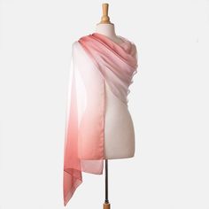 There's nothing like an Italian silk wrap to add a touch of chic elegance to your look.This gossamer-light silk chiffon wrap will add classic femininity to your look, effortlessly complementing any ensemble with grace and charm.A flowing sheer color ombré from peach blossom pink to white. Details Generous size: Approx. 27” x 78” (70 x 200cm). This wrap can be worn as an elegant evening shawl and as a daytime scarf. A timeless addition to your wardrobe. 100% silk chiffon: A luxurious, gossamer-li Elegant Silk Chiffon Scarves For Summer, Feminine Silk Scarves For Formal Occasions, Silk Shawl For Spring Formal Events, Silk Shawl For Spring Formal Occasions, Silk Shawl For Formal Spring Events, Spring Formal Silk Shawl, Formal Feminine Silk Scarves, Formal Silk Scarf For Summer, Elegant Silk Shawl Scarf For Summer