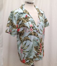 Womens Aqua & Coral Pink Aloha Shirt, Tropical Ginger Flowers on Hawaiian Blouse. Gorgeous Vibrant full-color images in just the right color combo to make you look your best. * Fitted short sleeve shirt with a notched lapel and button up front closure. * Made of high-quality 100% quick dry polyester poplin * Lightweight and breathable * Hand Wash with Delicate Soap and Hang Dry * Available in sizes from XS up to 3XL This fabric pattern is available by the yard at our custom fabric ETSY shop: Hawaiian Collared Tops With Graphic Print, Hawaiian Collared Top With Graphic Print, Collared Tops With All Over Print For Vacation, Summer Short Sleeve Graphic Print Blouse, Summer Short Sleeve Blouse With Graphic Print, Hawaiian Tops With All Over Print And Camp Collar, Hawaiian Tops With Camp Collar And All Over Print, Hawaiian Camp Collar Top With All Over Print, Graphic Print Short Sleeve Blouse For Vacation