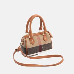 This women's mini crossbody handbag is the perfect accessory for everyday style. Made with high-quality linen material, this bag features a trendy brown patchwork design and a soft, lightweight construction. The European and American vintage style adds a touch of sophistication to any outfit. With its compact size and convenient zip closure, this bag is both stylish and practical.

 	Weight: 0.7kg
 	Dimensions: 18cm x 9cm x 13cm (7.1" x 3.5" x 5.1")
 	Popular elements: Plaid pattern
 	Lining material: Polyester-cotton
 	Closure type: Zipper
 	Interior structure: Card pocket
 	Hardness: Soft
 	Shoulder strap: Single adjustable strap
 	Suitable for: Daily use, casual occasions Leather Sling Bags, Prom Bag, Leather Hobo Bags, Small Leather Purse, Woven Leather Bag, Clear Tote Bags, White Crossbody Bag, Crossbody Handbags, Pink Tote Bags