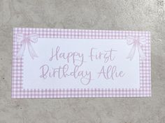 a pink and white birthday card with the words happy first birthday alie on it