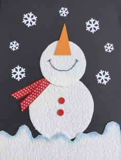 a snowman made out of felt on a black background