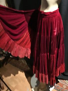 "Exceptional and rare, full circle skirt made with 4 different kinds of velvet: panne' and silk velvet, in Scarlet red and burgundy. TONS of material. Unlined. Closes with side hooks. Waist measures 26\" around. Length from waist to hem is 32\"." Fitted Peasant Style Festival Skirt, Fitted Peasant Skirt For Festival, Bohemian Tiered Skirt With Attached Cancan, Fitted Bohemian Skirt For Dance, Bohemian Fitted Skirt For Dance, Bohemian Skirt With Attached Cancan, Bohemian Full-length Skirt For Festivals, Full Length Bohemian Skirt For Festival, Fitted Bohemian Skirt With Attached Cancan