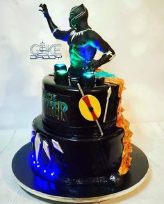 a cake that has a statue on top of it