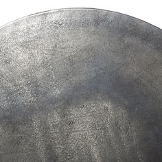 a large metal plate sitting on top of a table