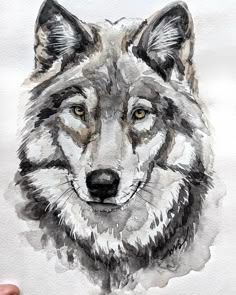 a drawing of a wolf with yellow eyes